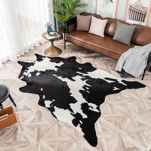 Load image into Gallery viewer, Black &amp; White faux cowhide ride
